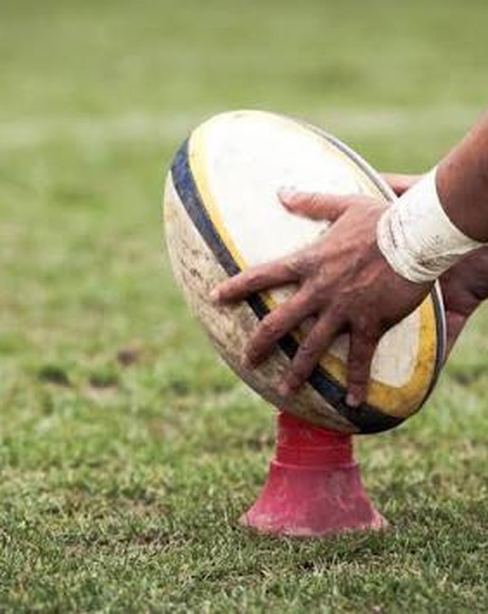 Jugadores de rugby en fase de placaje